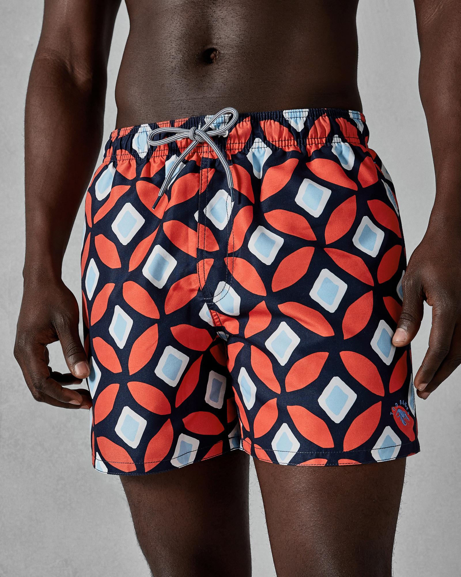 SUNFISH Large geo print swim shorts