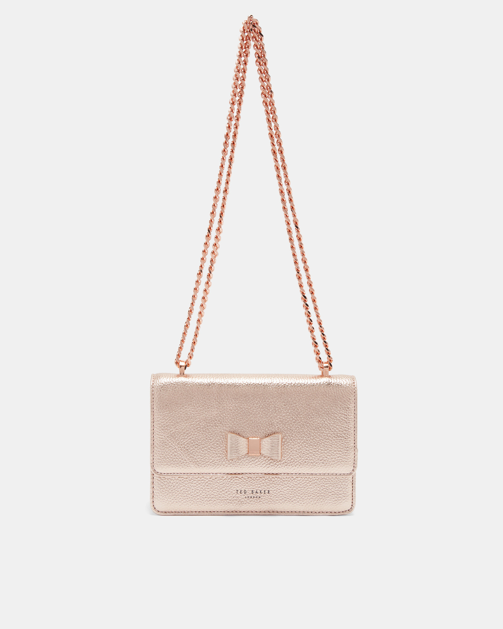 DRAYAA Bow detail metallic leather cross body bag